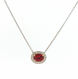 OVAL RUBY WITH DIAMOND HALO NECKLACE